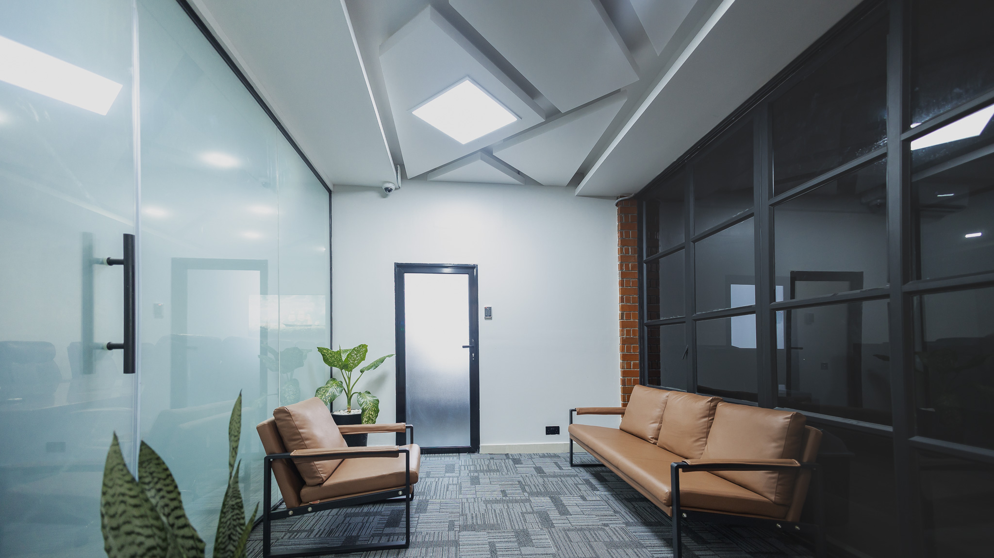 Conference room with orange walls and city view